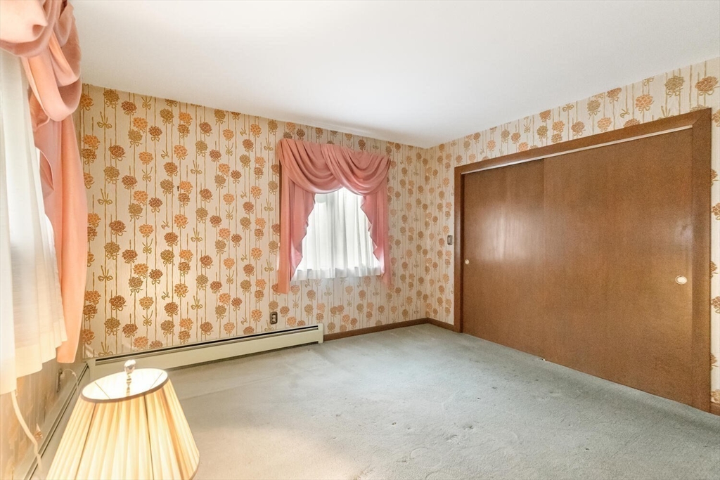 4 R Forest Street Peabody, MA 01960 - Photo 25 of 33 a view of an empty room with a window