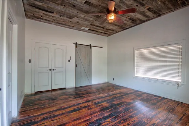 a bathroom with a toilet a sink and bathtub