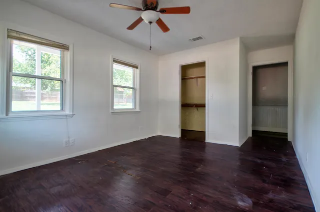 a view of a house with pool from a balcony