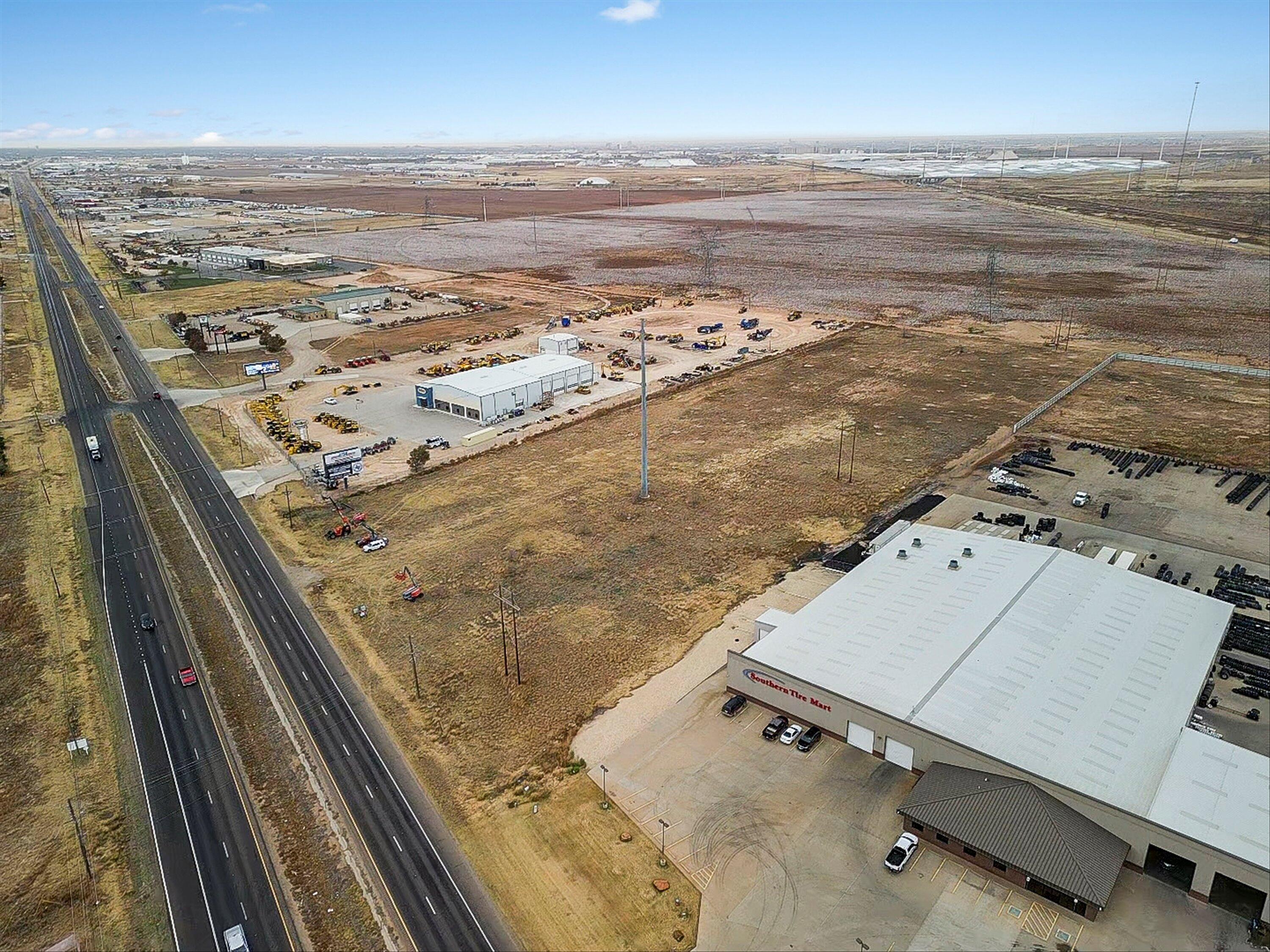 3423 Slaton Road Lubbock, TX 79404 - Photo 3 of 12 an aerial view of residential houses with outdoor space