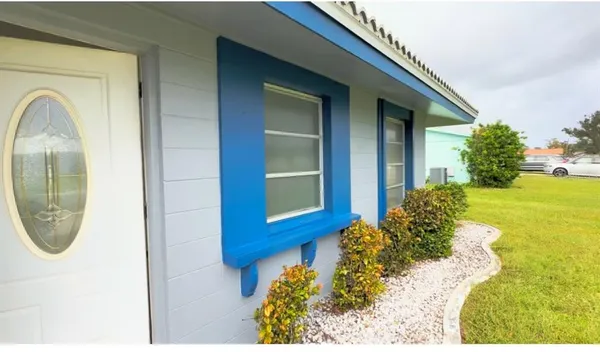 a view of a house with a swimming pool