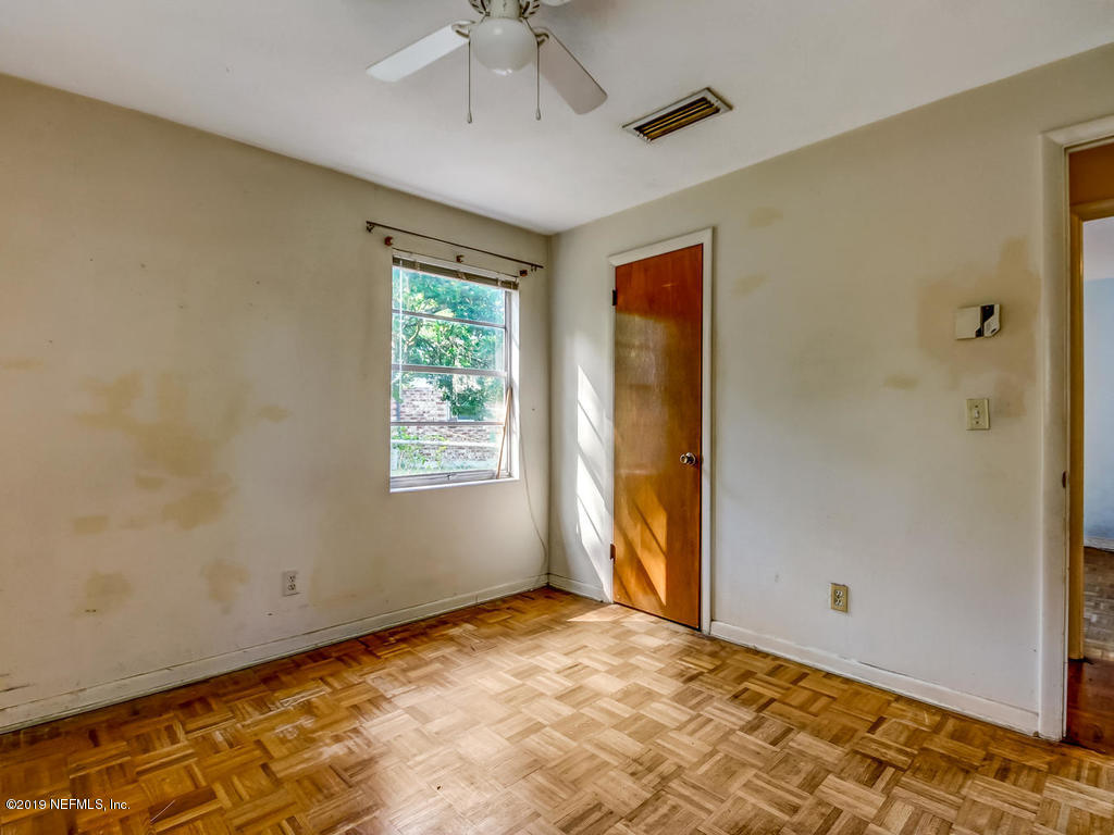 1060 Player Road Jacksonville, FL 32218 - Photo 22 of 37 a view of an empty room and window