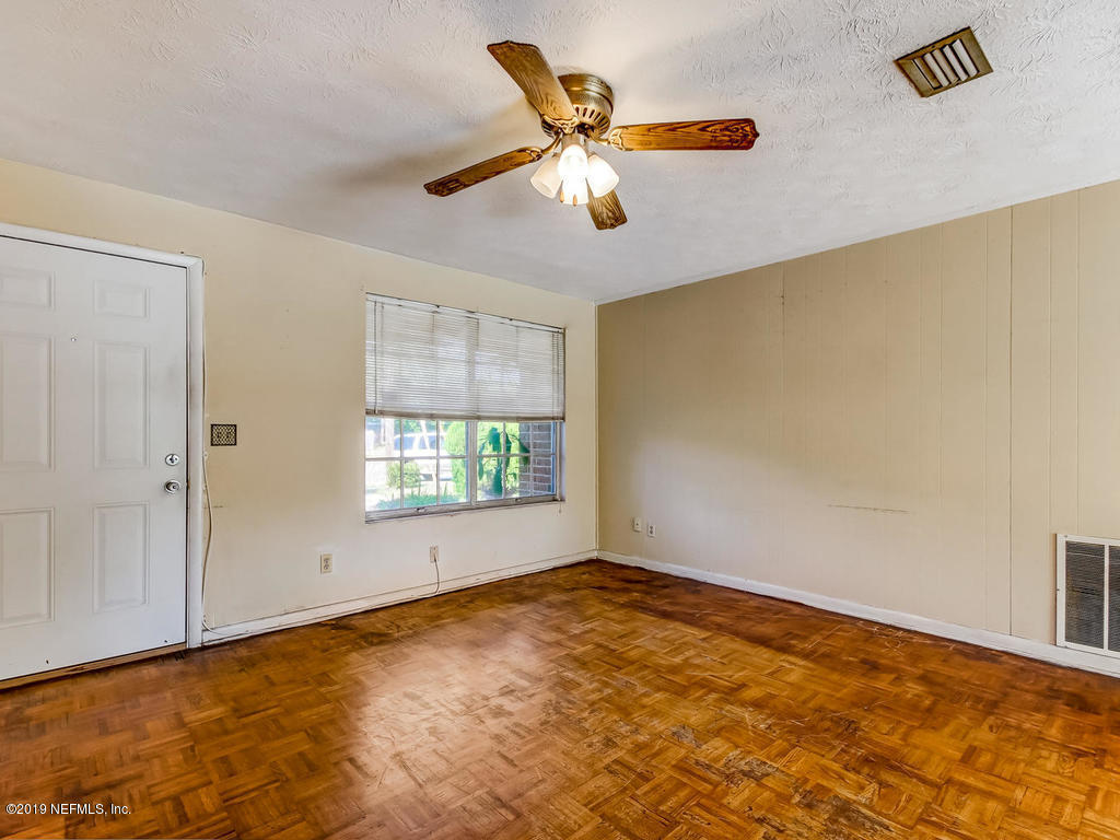 1060 Player Road Jacksonville, FL 32218 - Photo 10 of 37 a view of an empty room with a window