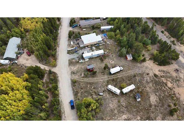 a upper view of a house with a yard