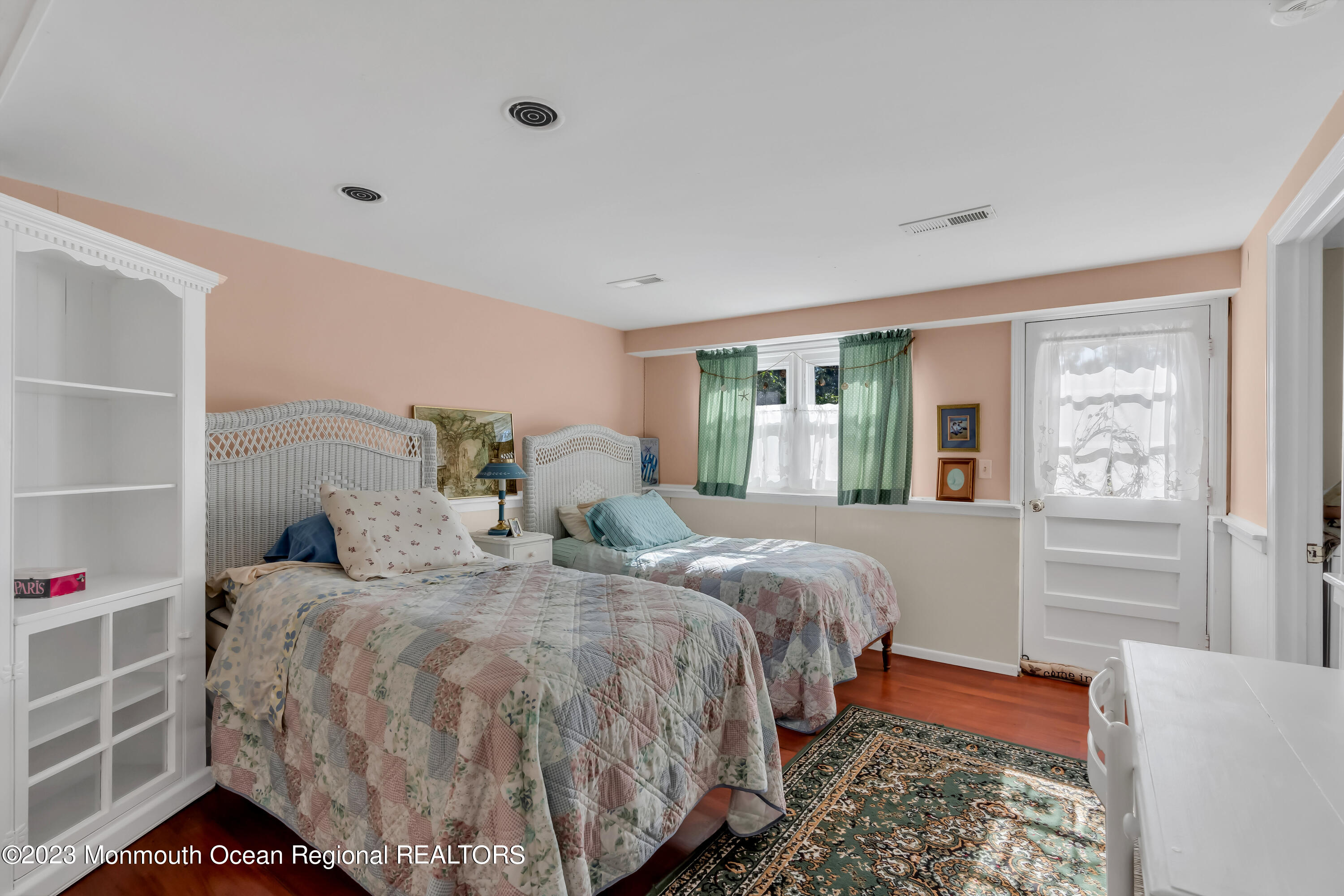 1305 Allaire Road Spring Lake, NJ 07762 - Photo 20 of 27 a bed room with a bed and a window
