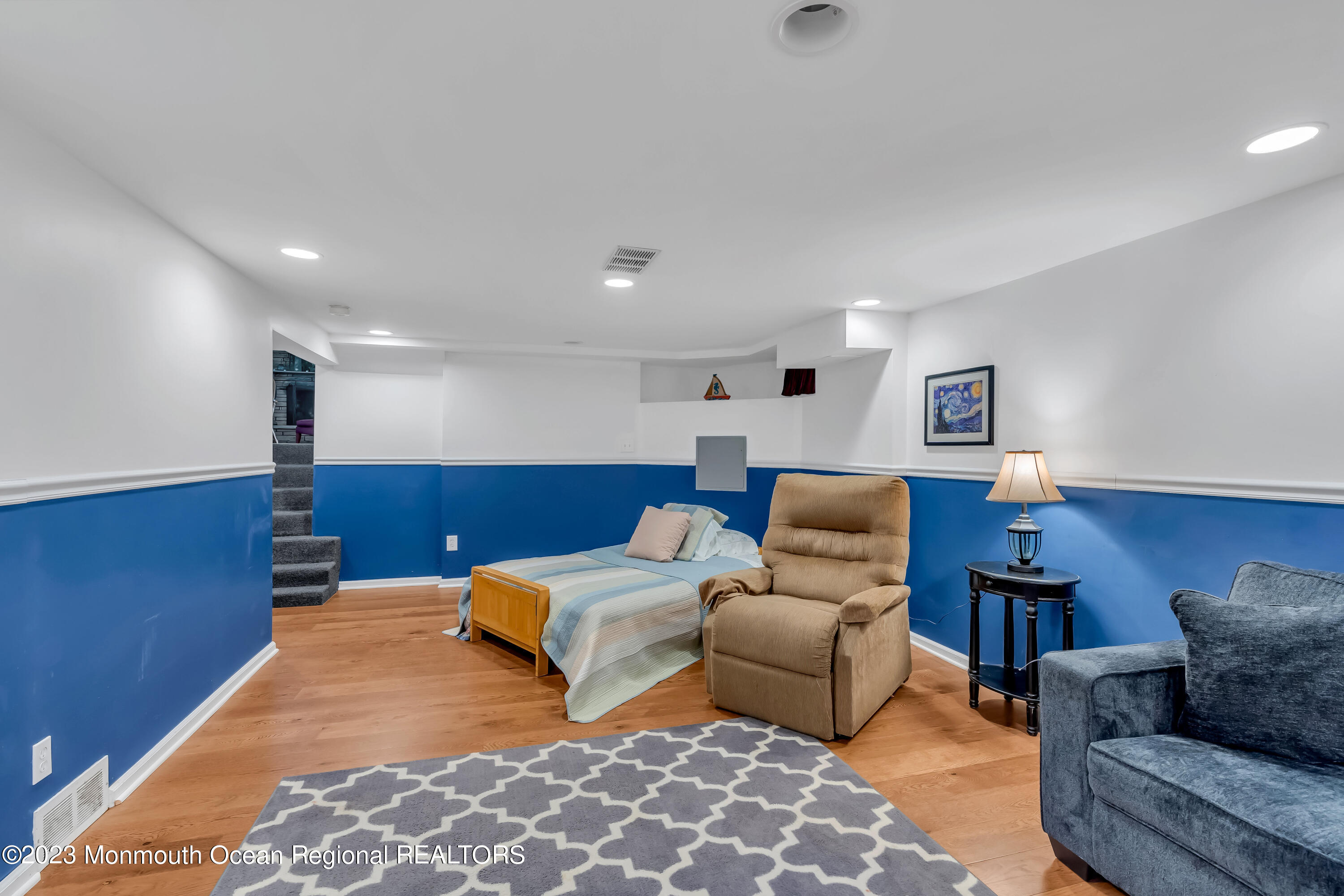 1305 Allaire Road Spring Lake, NJ 07762 - Photo 23 of 27 a living room with furniture and wooden floor