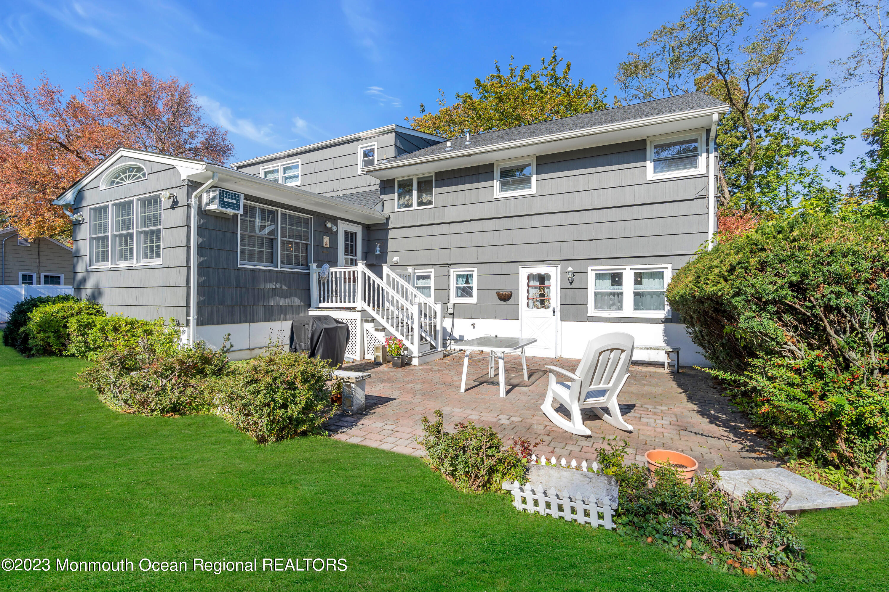 1305 Allaire Road Spring Lake, NJ 07762 - Photo 27 of 27 a front view of a house with garden