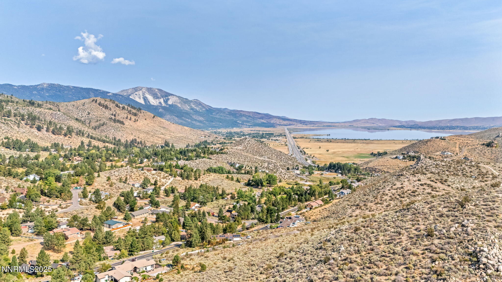 3733 Buckskin Road Carson City, NV 89703 - Photo 2 of 13 a view of a city with mountains in the background