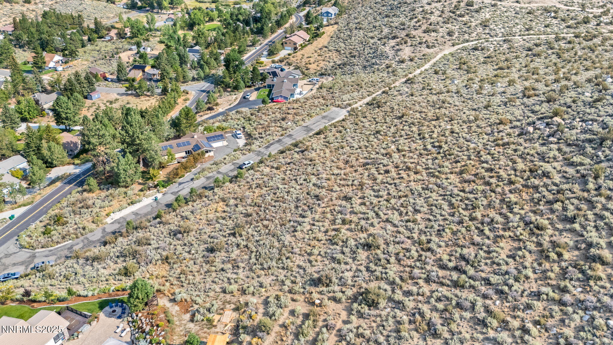 3733 Buckskin Road Carson City, NV 89703 - Photo 5 of 13 a picture of street with a small yard