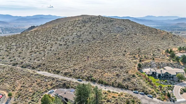 a view of a city with mountains