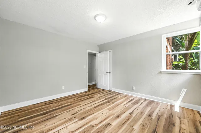 a kitchen with stainless steel appliances a refrigerator and a stove top oven