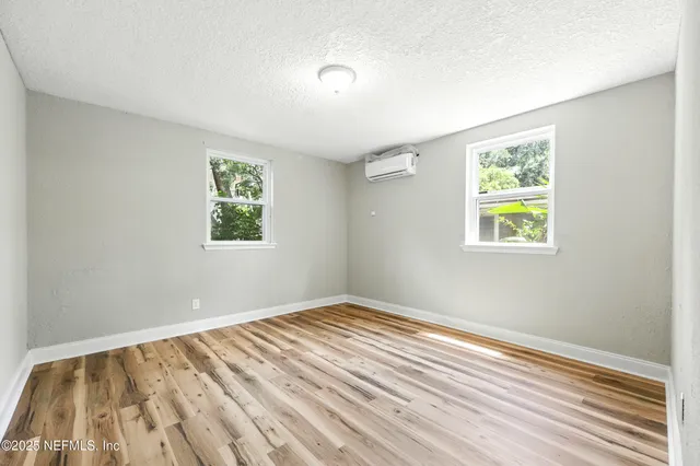 a stove top oven sitting inside of a kitchen