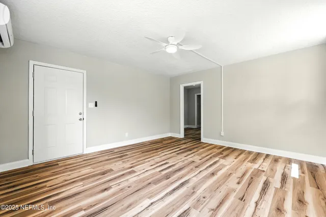 a kitchen with a sink and large window