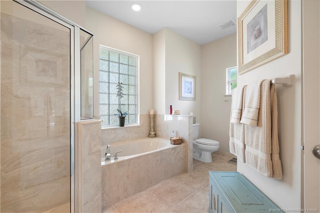 1234 Southwest Locks Road Stuart, FL 34997 - Photo 15 of 52 Owner's Suite Bathroom