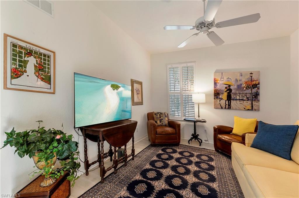 17819 Modena Road Fort Myers, FL 33913 - Photo 21 of 50 a living room with furniture and a rug