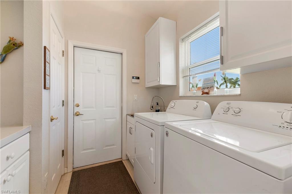 17819 Modena Road Fort Myers, FL 33913 - Photo 22 of 50 a utility room with dryer and washer