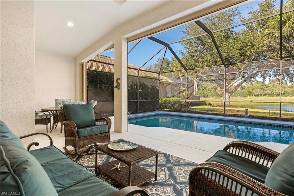 17819 Modena Road Fort Myers, FL 33913 - Photo 23 of 50 a balcony with furniture and wooden floor