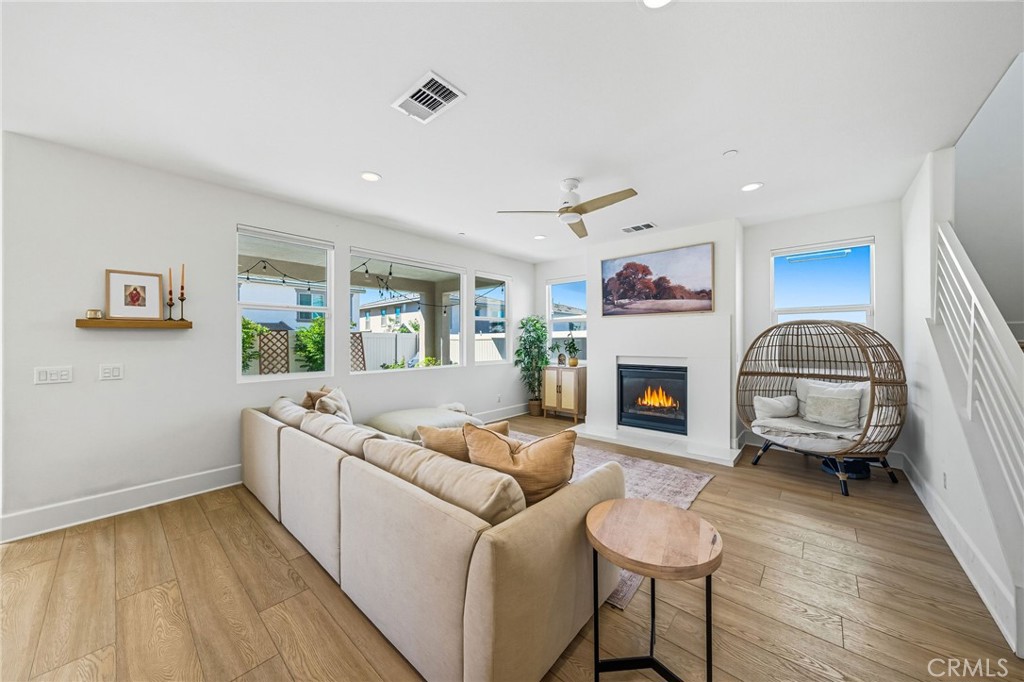 32017 Radiant Drive Temecula, CA 92591 - Photo 11 of 74 a living room with furniture and a fireplace