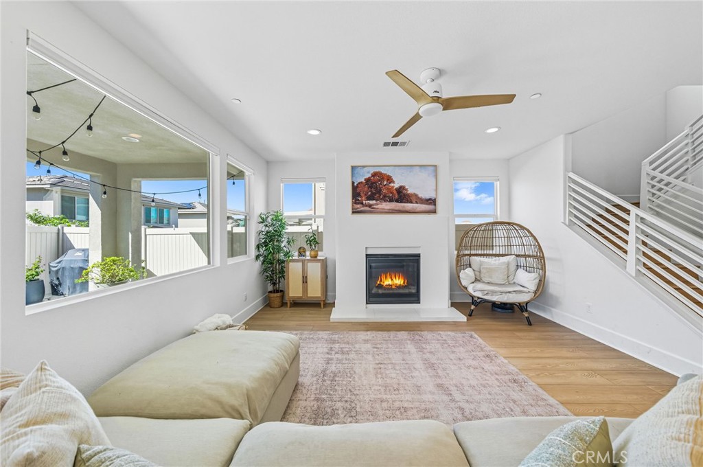 32017 Radiant Drive Temecula, CA 92591 - Photo 13 of 74 a living room with furniture and a fireplace