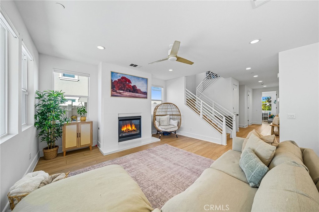 32017 Radiant Drive Temecula, CA 92591 - Photo 14 of 74 a living room with furniture and a fireplace