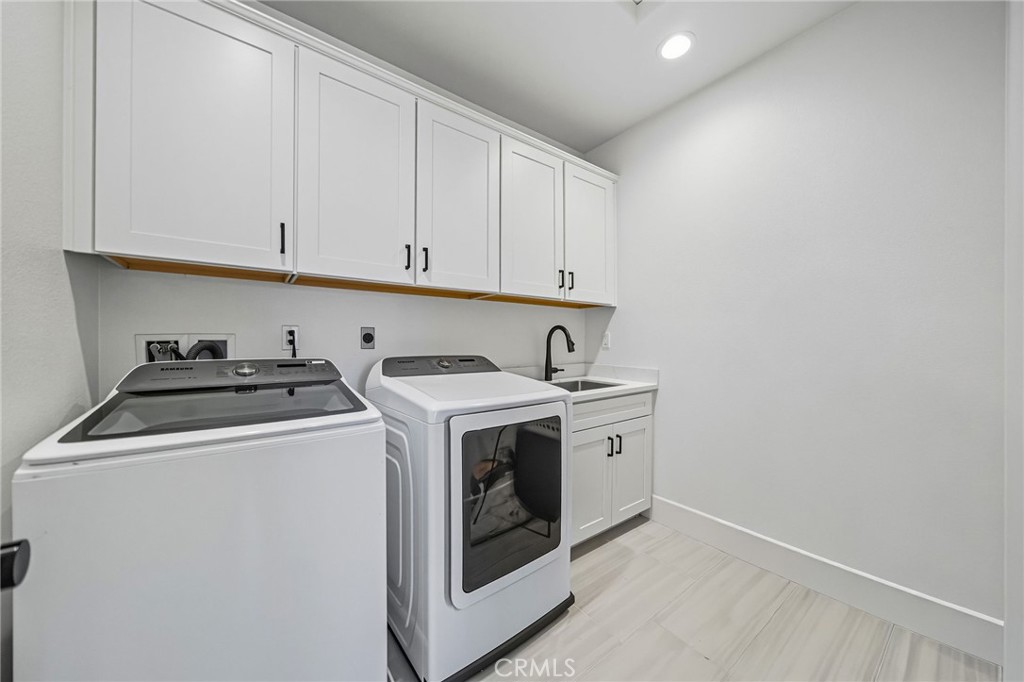 32017 Radiant Drive Temecula, CA 92591 - Photo 46 of 74 a view of a storage and utility room with washer and dryer