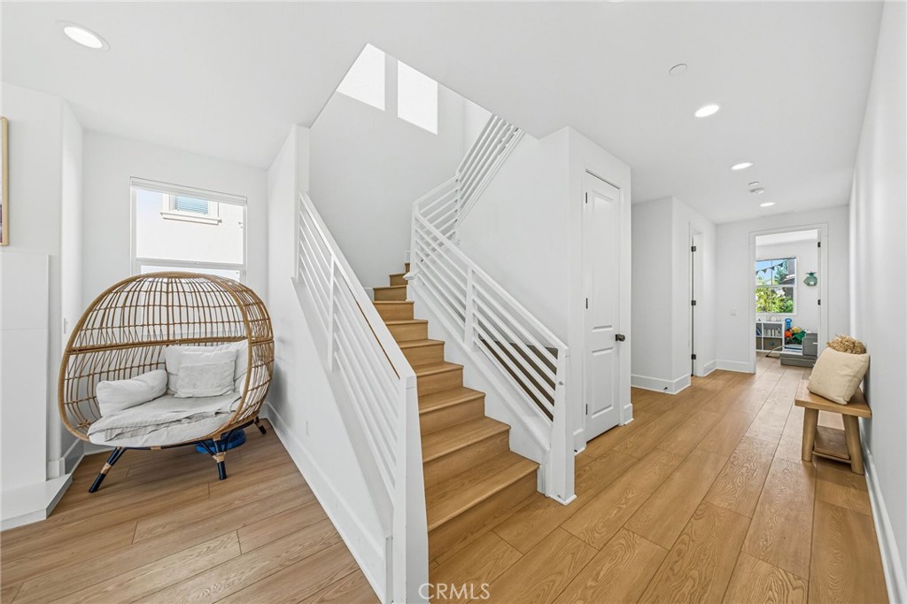 32017 Radiant Drive Temecula, CA 92591 - Photo 9 of 74 a view of entryway and hall with wooden floor