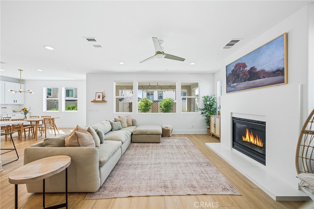 32017 Radiant Drive Temecula, CA 92591 - Photo 10 of 74 a living room with furniture and a fireplace