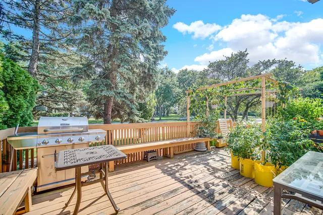 a view of a backyard with sitting area