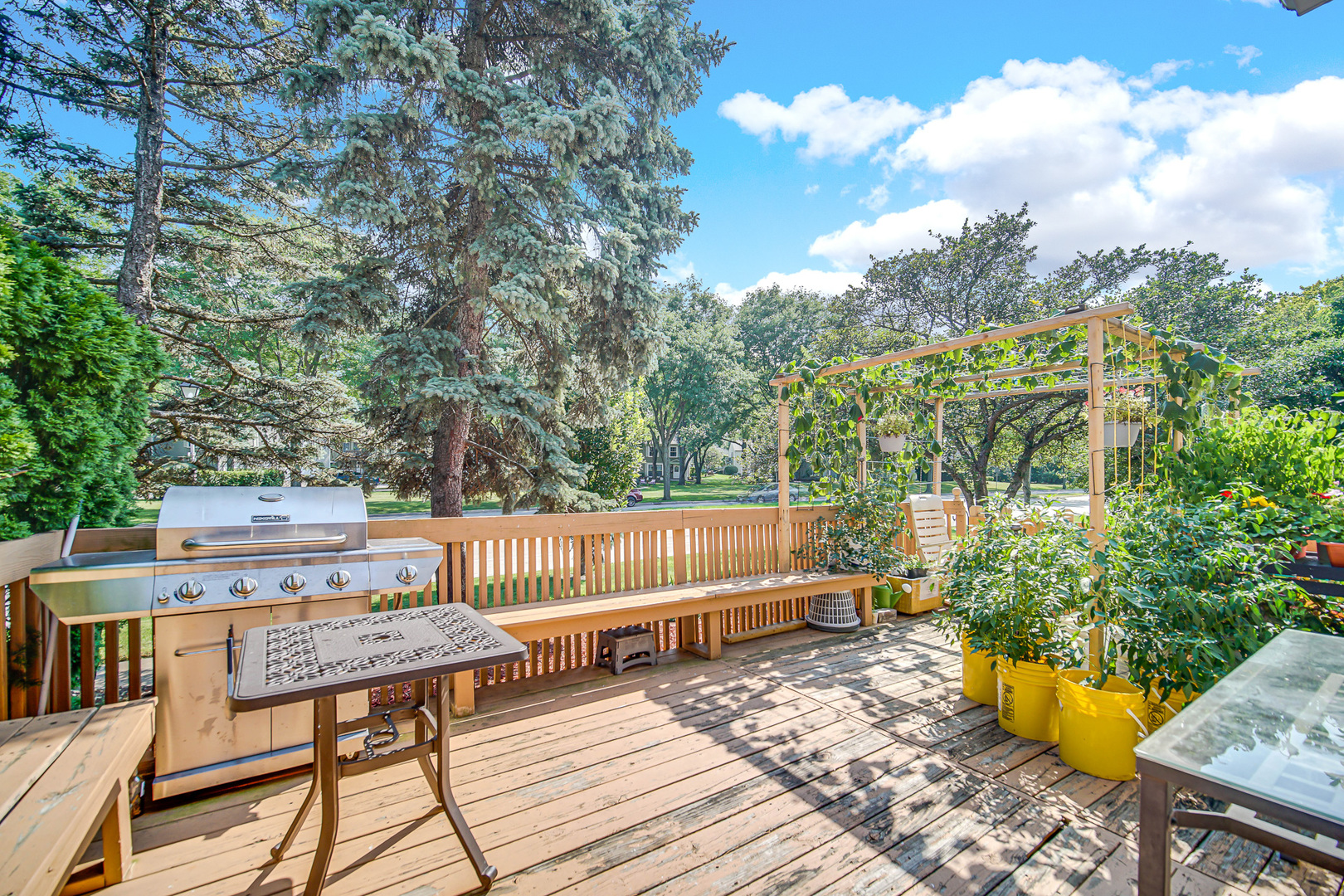 1010 Heathrow Court Wheaton, IL 60189 - Photo 21 of 24 a view of a backyard with sitting area