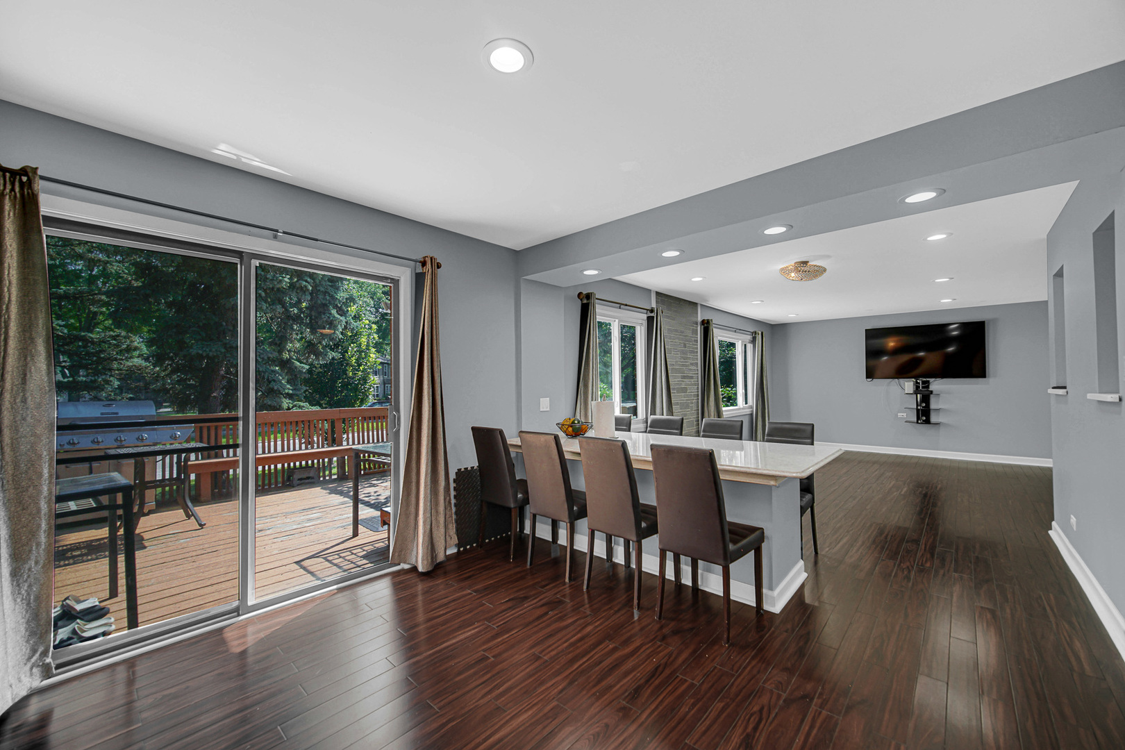 1010 Heathrow Court Wheaton, IL 60189 - Photo 9 of 24 a view of a dining room with furniture window and wooden floor