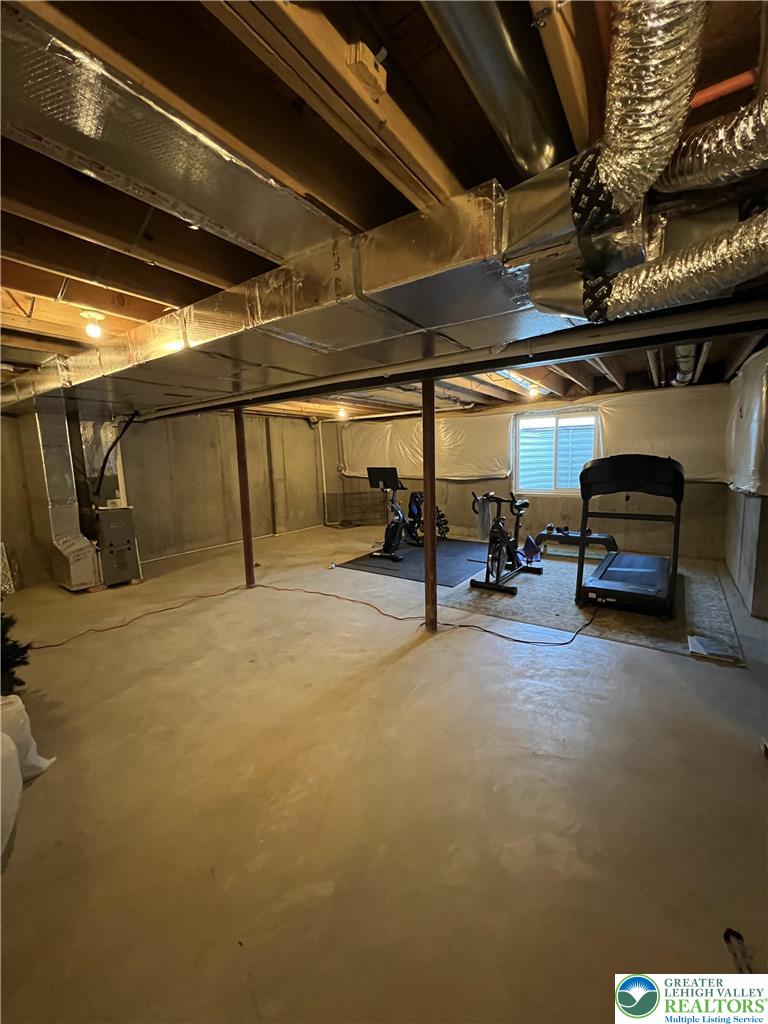 5380 Jutland Road Allentown, PA 18104 - Photo 25 of 27 A spacious, unfinished basement offers endless possibilities for customization and future expansion.