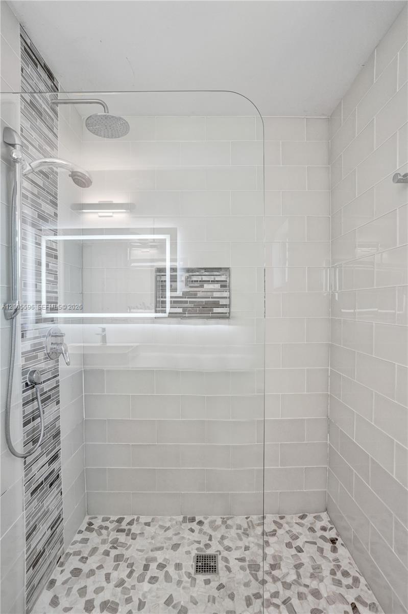 4281 Laurel Ridge Circle Weston, FL 33331 - Photo 60 of 80 a bathroom with a shower