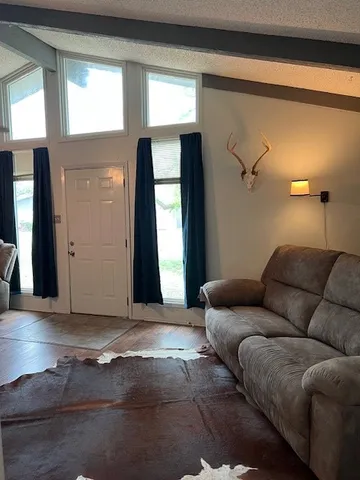 a large bathroom with a double vanity sink and a mirror