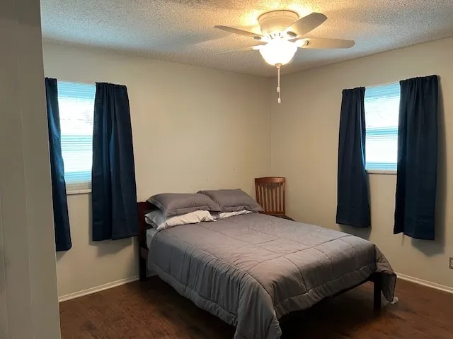 a view of gallery with wooden floor