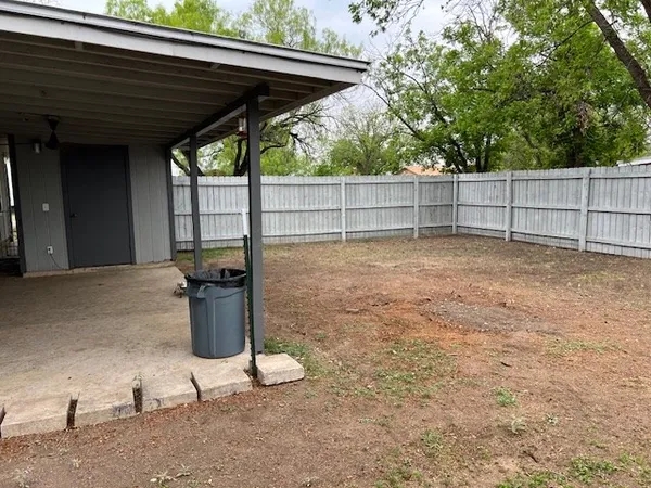 a view of backyard of house