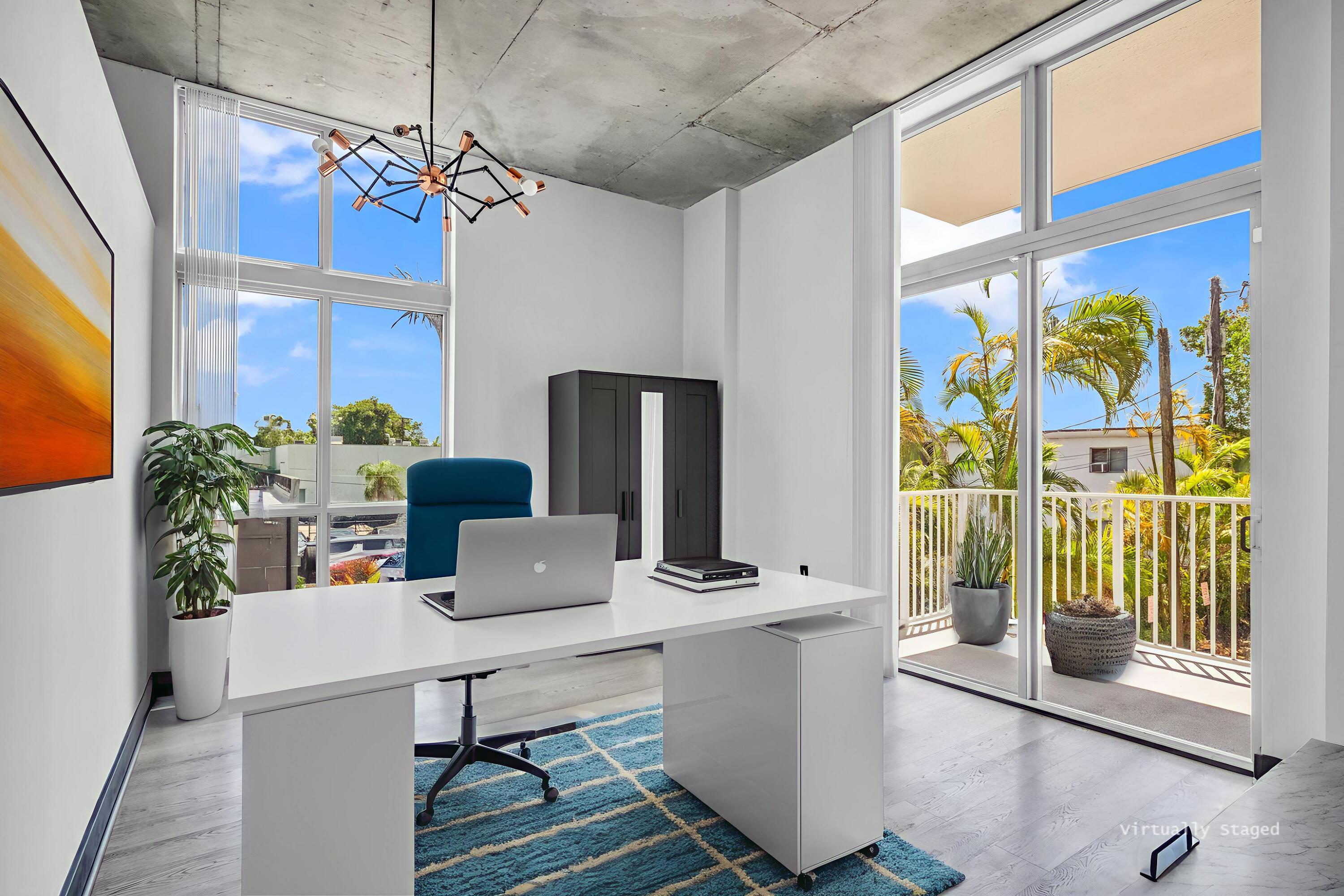 2100 Van Buren Street, Unit 203 Hollywood, FL 33020 - Photo 12 of 28 a workspace with furniture and window