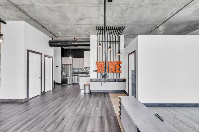 a view of entryway with wooden floor
