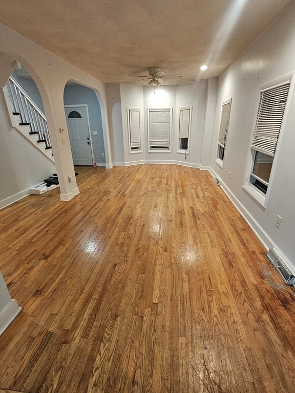 233-235 Main Street Everett, MA 02149 - Photo 5 of 20 a view of a room with wooden floor