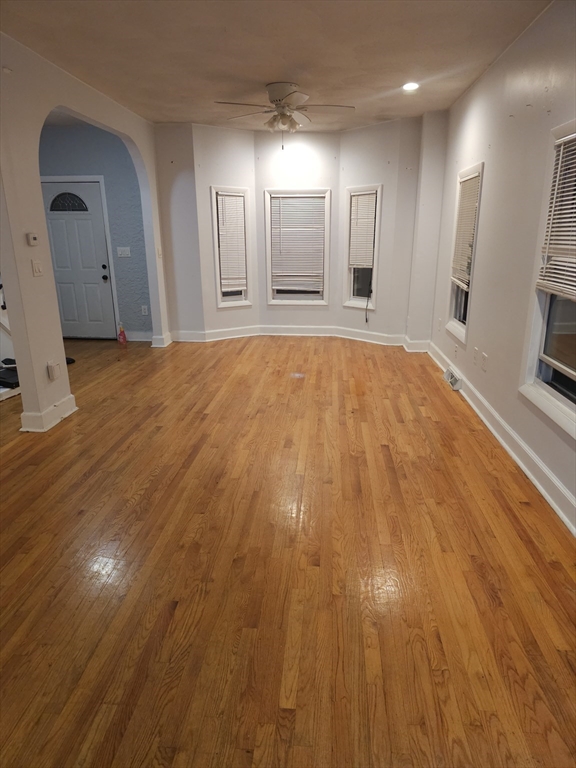 233-235 Main Street Everett, MA 02149 - Photo 6 of 20 a view of a livingroom with wooden floor