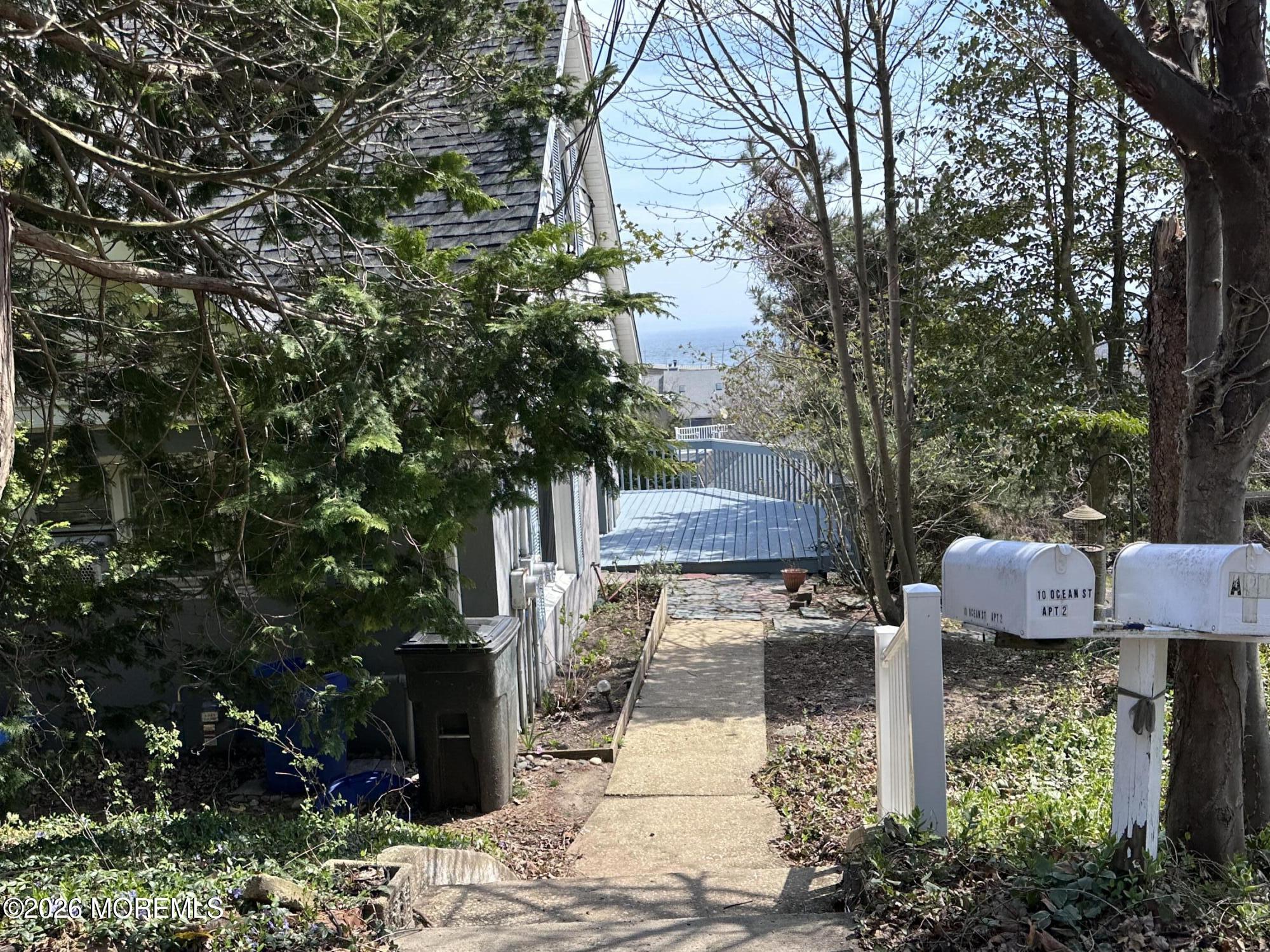 10 Ocean Street Highlands, NJ 07732 - Photo 15 of 15 a garden view with sitting space