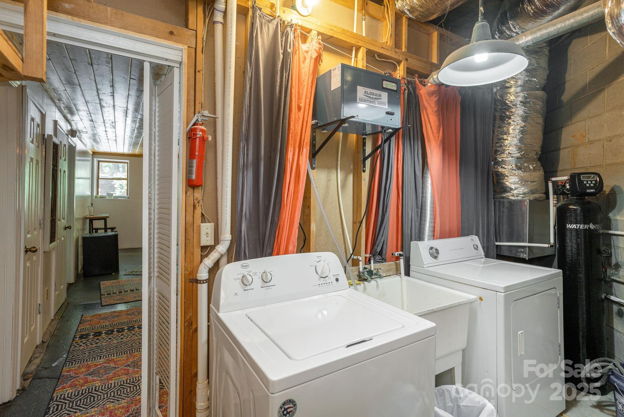 78 Bryant Road Swannanoa, NC 28778 - Photo 18 of 29 a utility room with dryer and washer