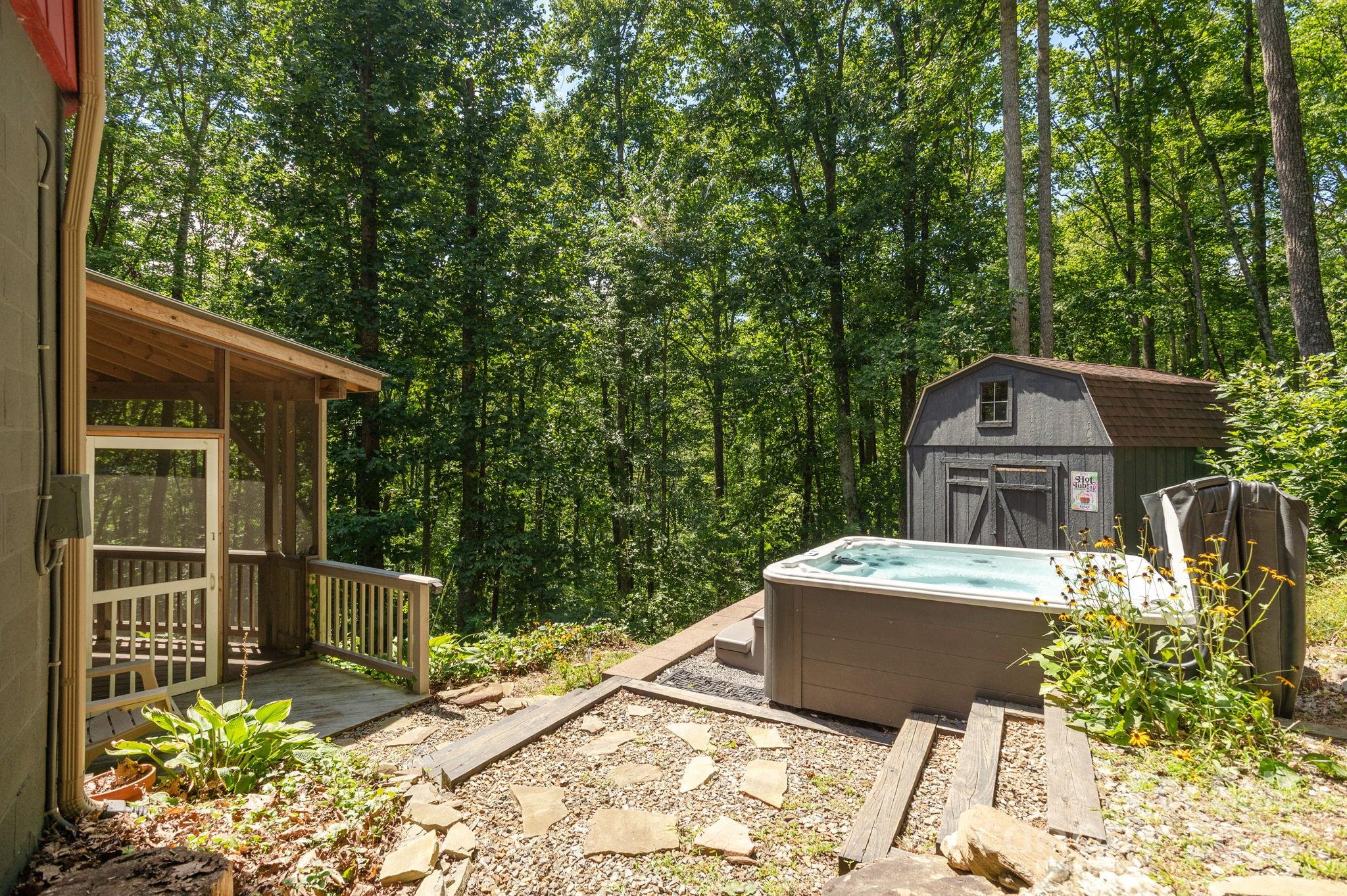 78 Bryant Road Swannanoa, NC 28778 - Photo 24 of 29 a front view of a house with a garden