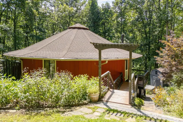an aerial view of a house with garden