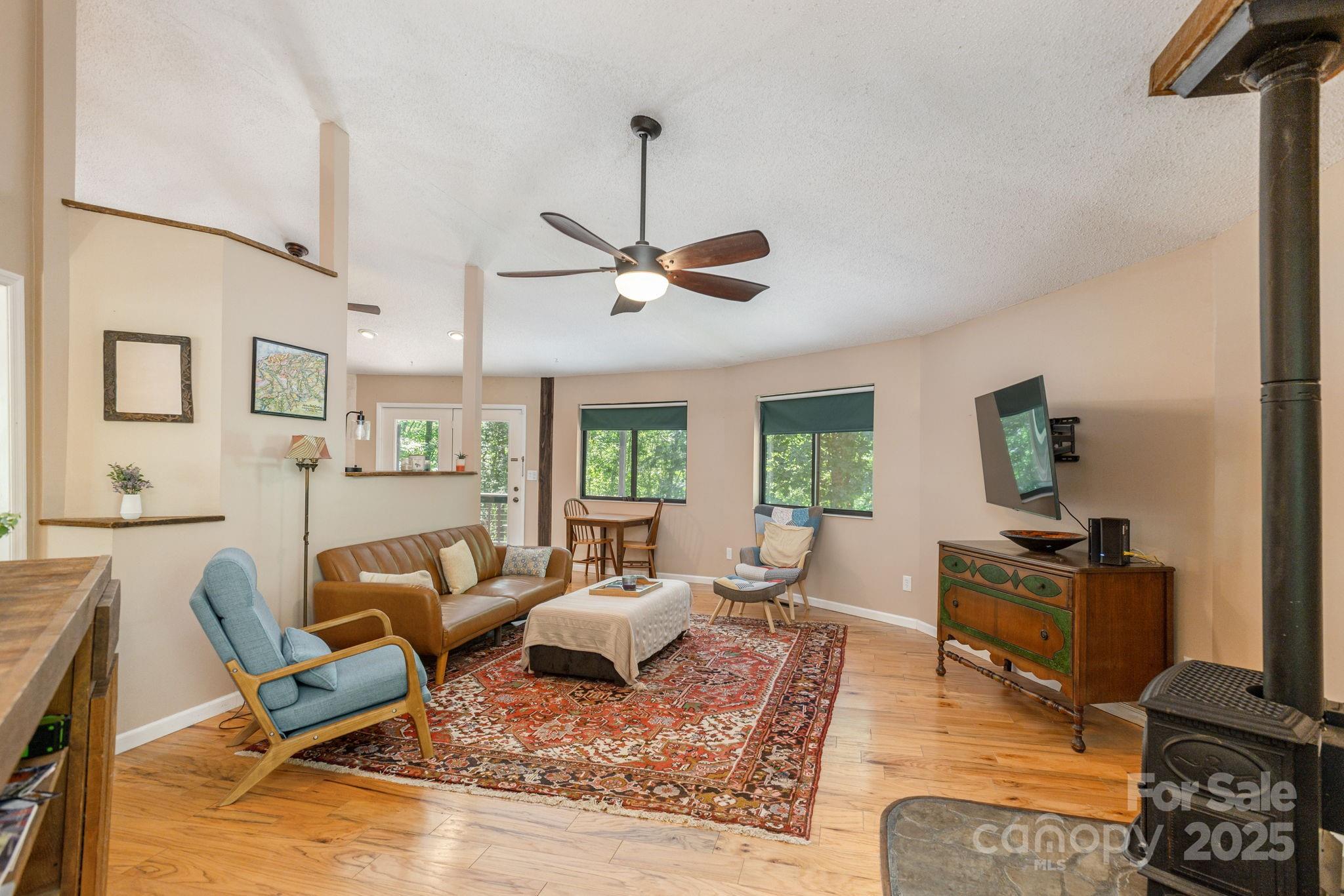 78 Bryant Road Swannanoa, NC 28778 - Photo 4 of 29 a living room with furniture a rug and a window