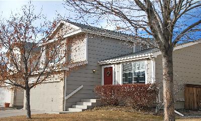 1119 Timbervale Trail Highlands Ranch, CO 80129 - Photo 1 of 1 a view of a house with a yard