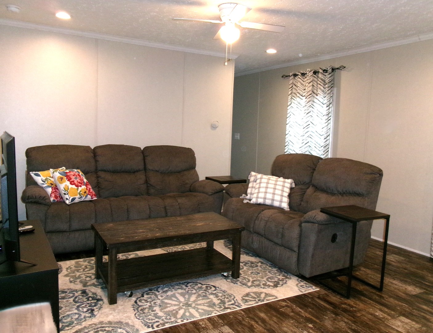 205 5th Street Carmi, IL 62821 - Photo 3 of 7 a living room with furniture and a flat screen tv