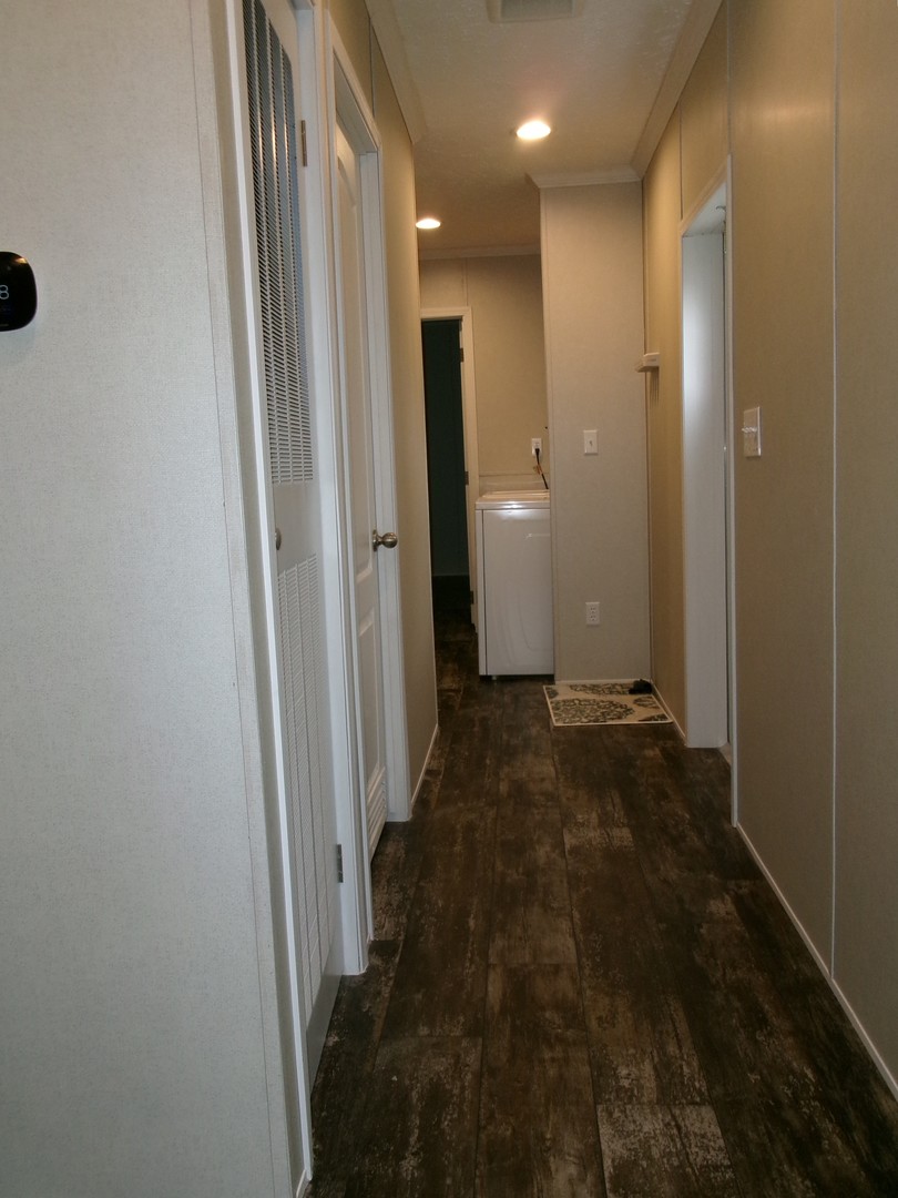 205 5th Street Carmi, IL 62821 - Photo 4 of 7 a view of a hallway