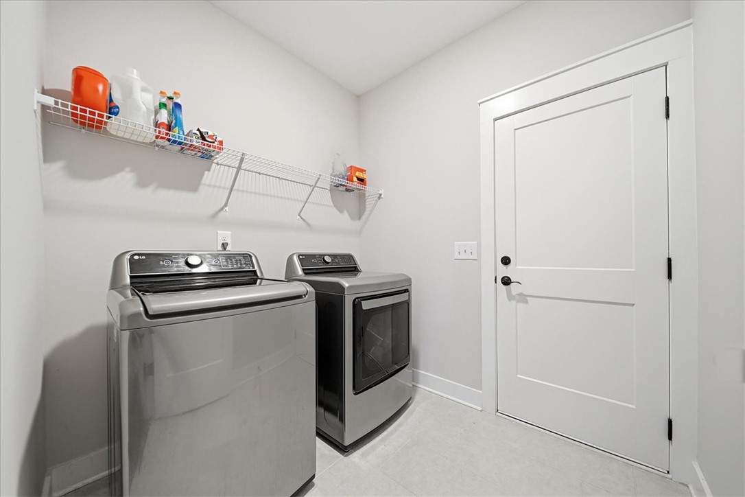 214 Timothy Court Anderson, SC 29621 - Photo 19 of 43 Functional utility room with efficient laundry appliances.