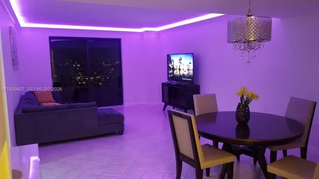 a view of kitchen with furniture and large window