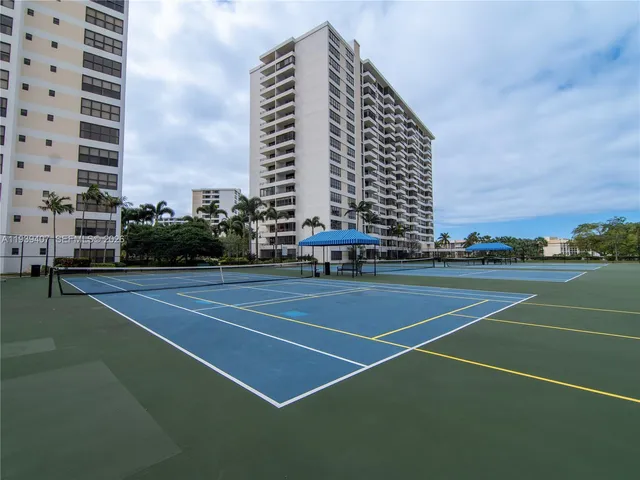a view of swimming pool with outdoor seating